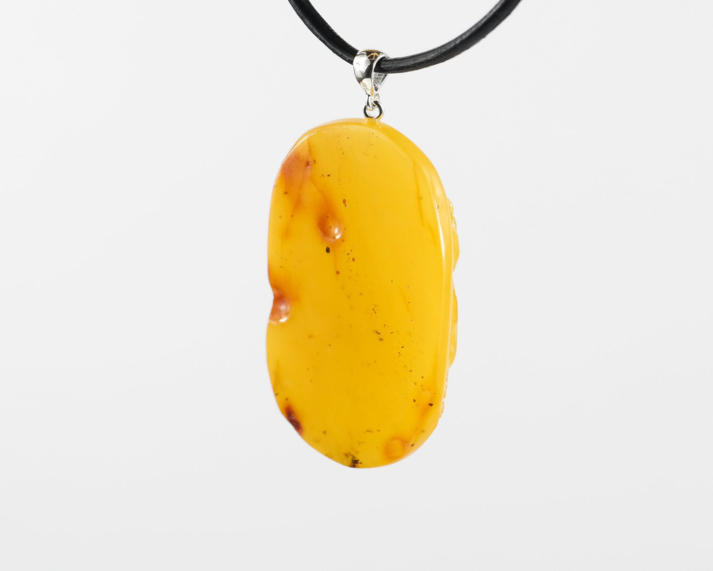 Hand Carved Baltic Amber Amulet of Maiden