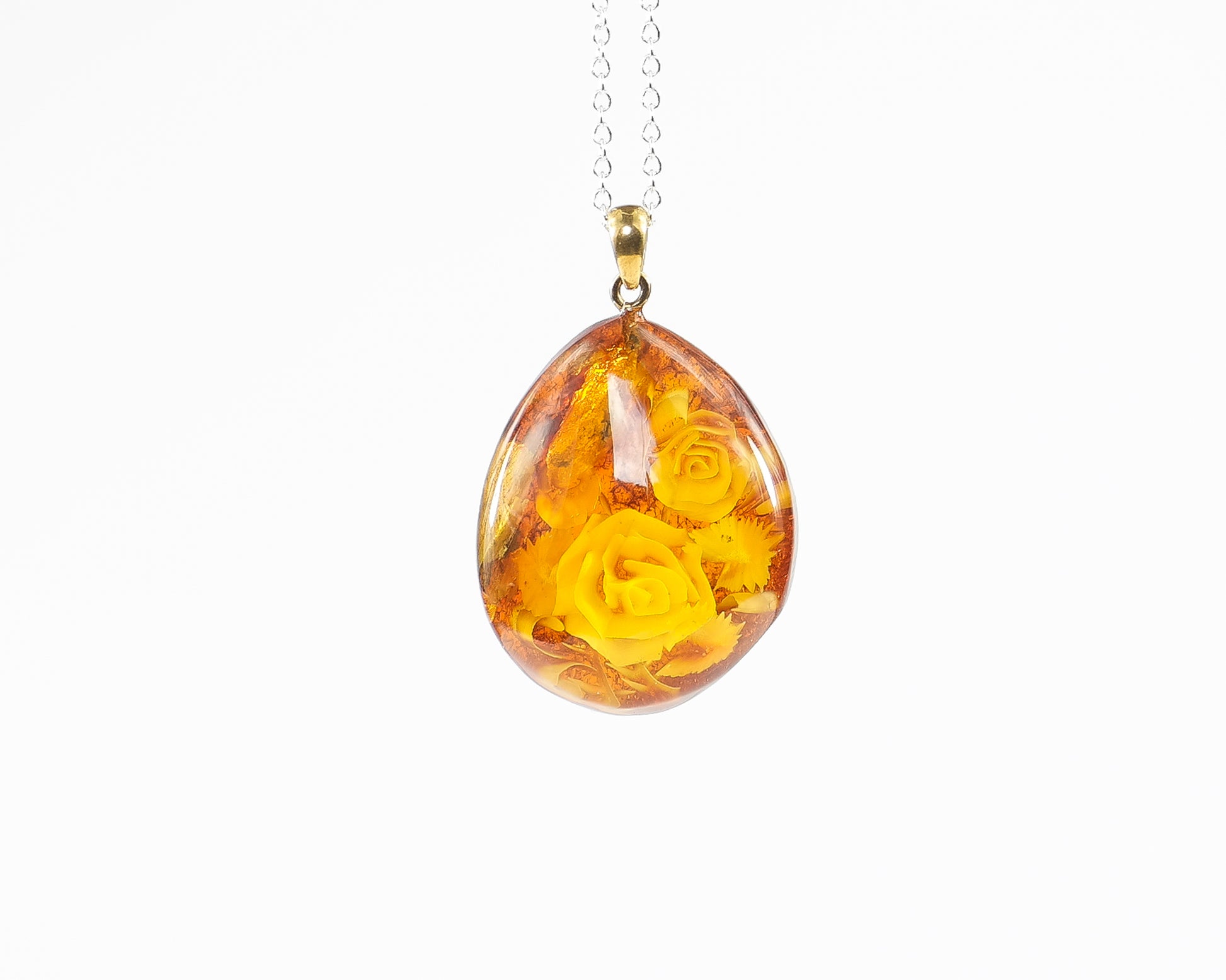 Baltic Amber Amulet With Floral Engraving