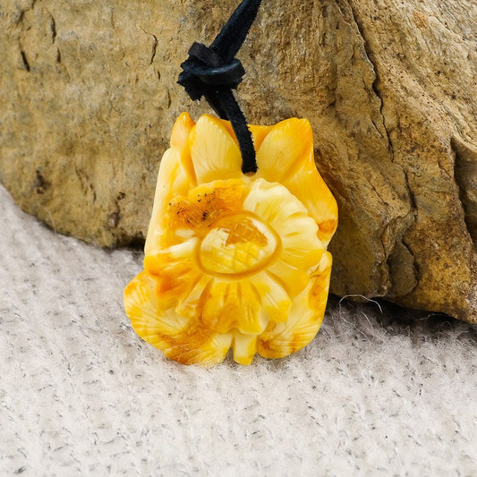 Amber amulet camomile