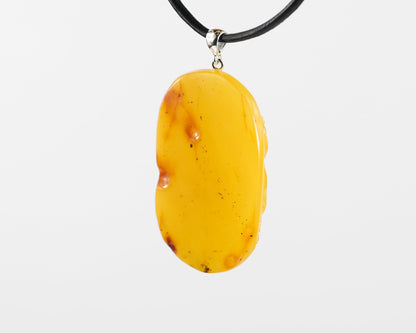 Hand Carved Baltic Amber Amulet of Maiden