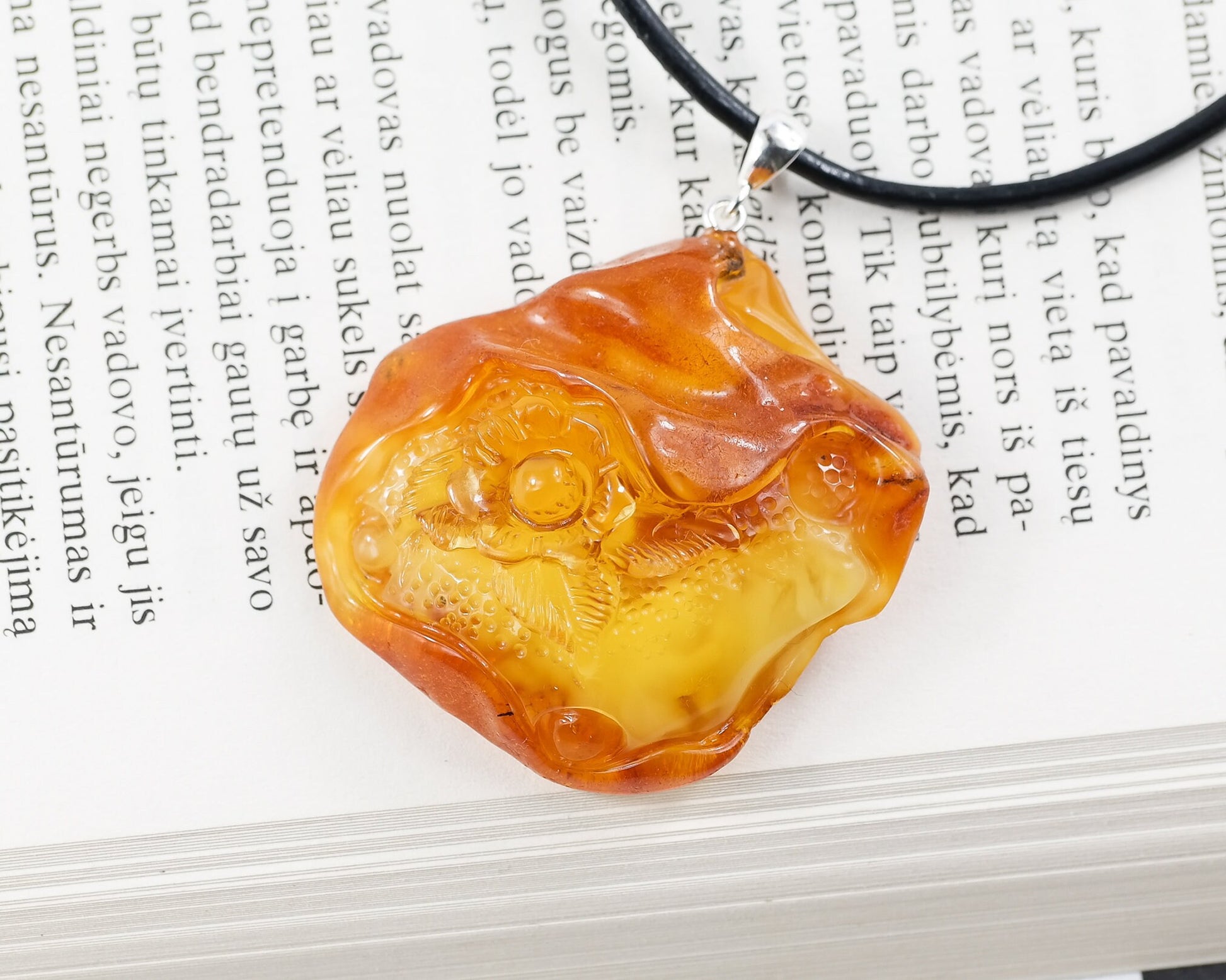 Floral amber amulet